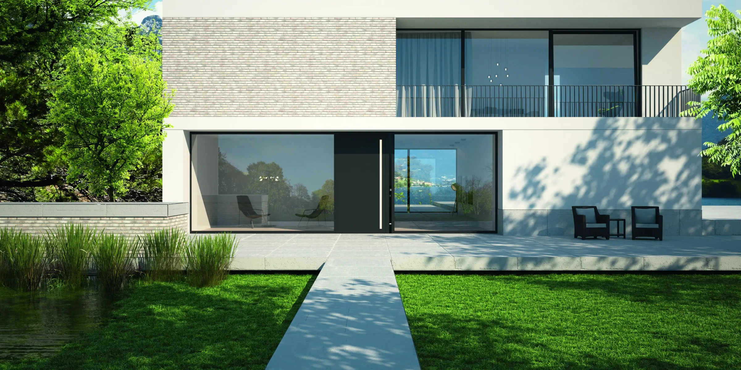 Villa moderna con grandi vetrate e portoncino in alluminio Schüco